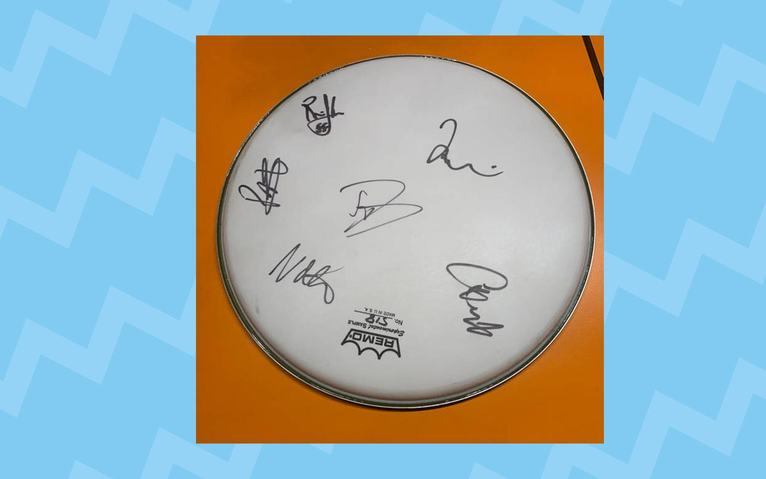 Text to WIN a drum skin signed by the Foo Fighters